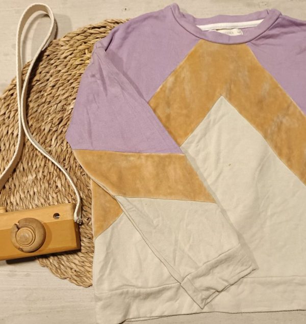 Buzo rapsodia T10 (detalle)